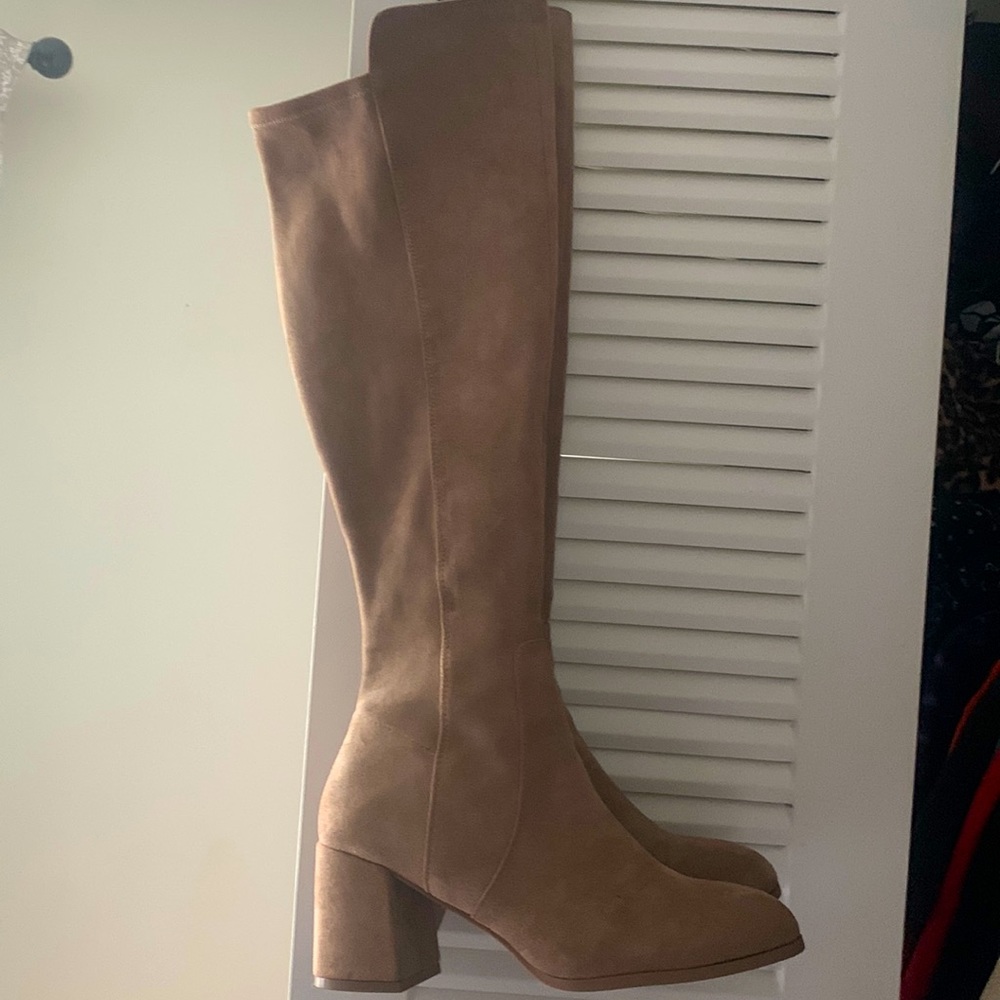 Tall boots just wearing one one time